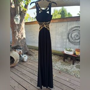 Black and Gold Sequin Open Back Betsy & Adam Prom Dress